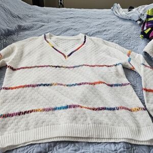 White V-Neck Sweater with Multicolor Stripe Accents